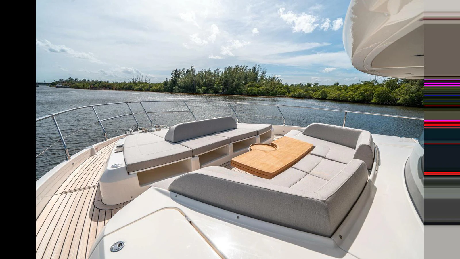 a boat on the water aboard OUR TRADE Yacht for Sale