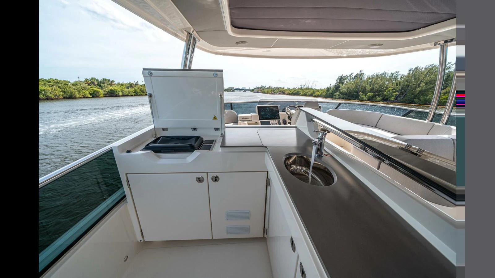 a boat on the water aboard OUR TRADE Yacht for Sale
