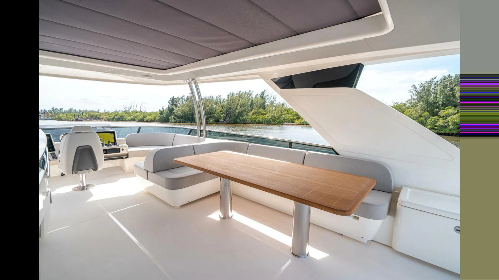a table on a deck aboard OUR TRADE Yacht for Sale