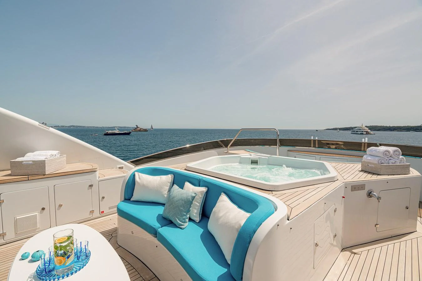The sundeck features a luxurious hot tub and comfortable seating with stunning ocean views. aboard BANG! Yacht for Sale