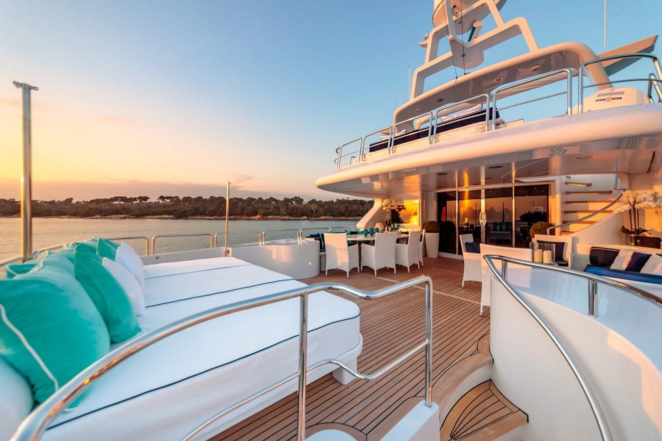 The sundeck offers a luxurious space for relaxation with plush seating and stunning views. aboard BANG! Yacht for Sale