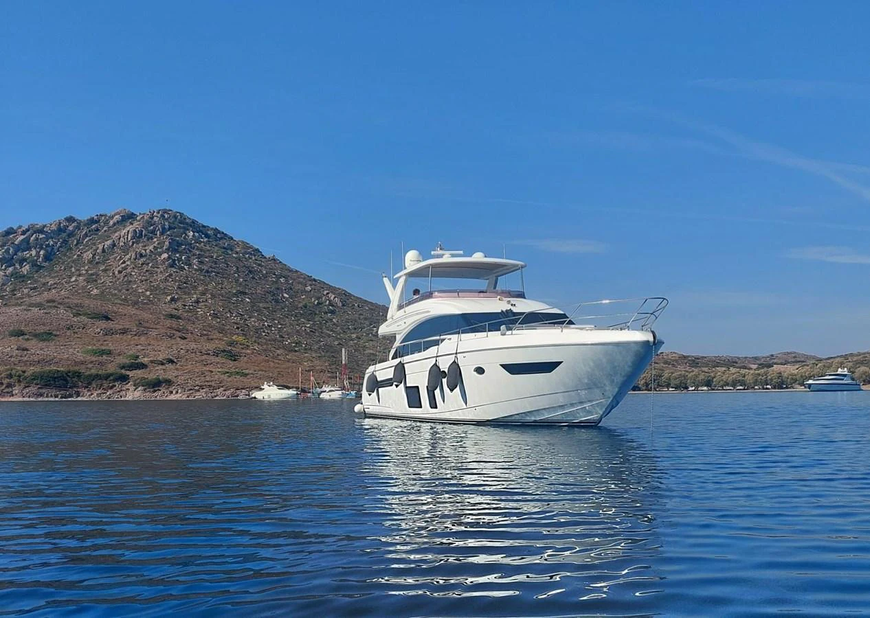 a white boat in the water aboard DANI Yacht for Sale