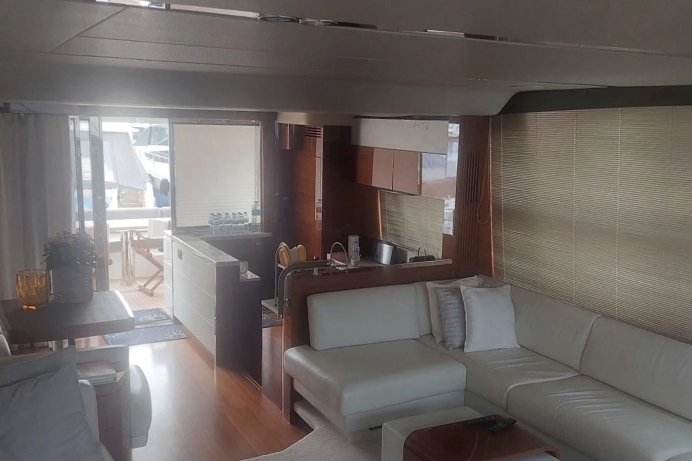 a living room with a couch and a table aboard DANI Yacht for Sale