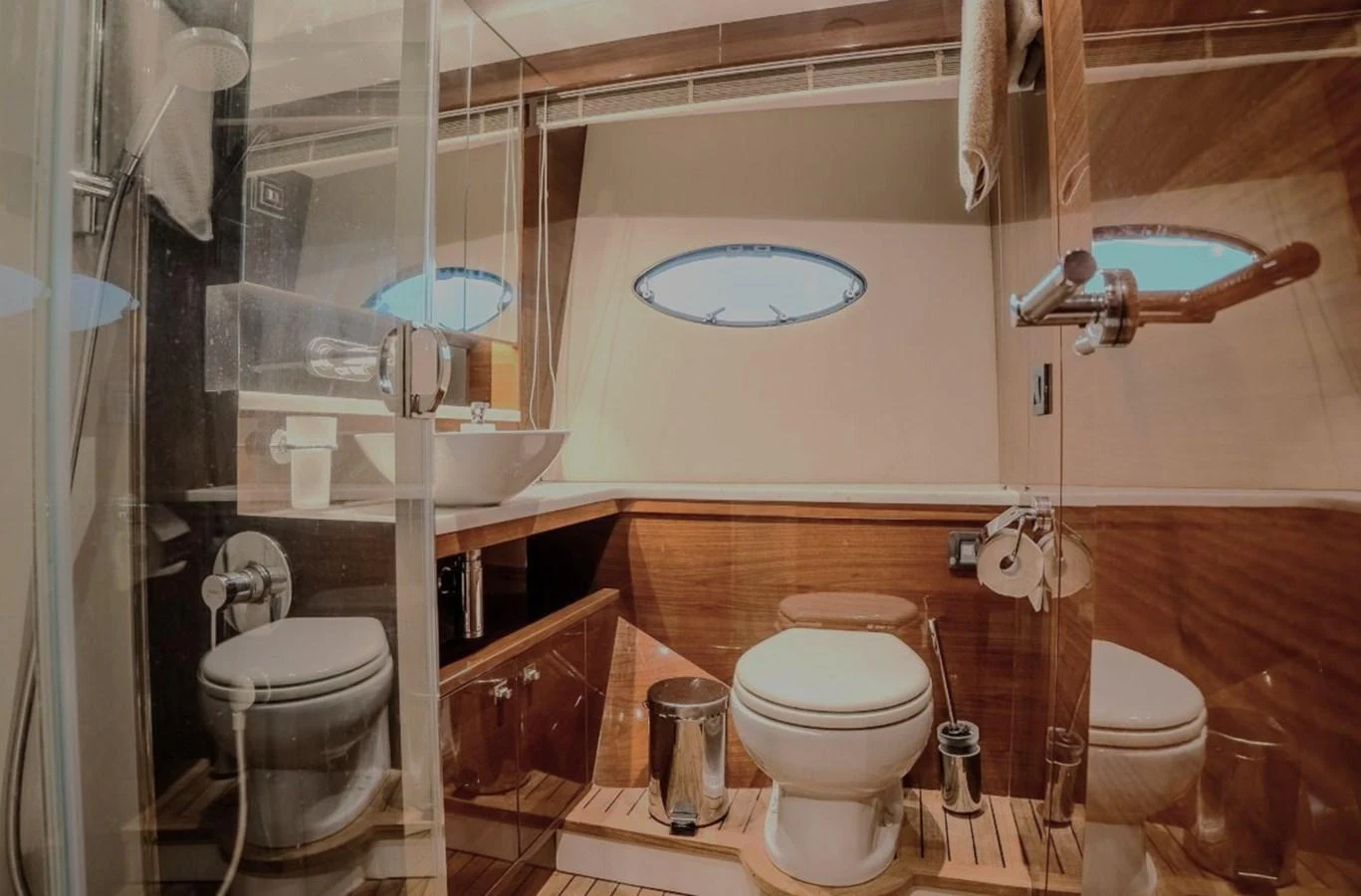 a bathroom with a toilet and sink aboard DANI Yacht for Sale