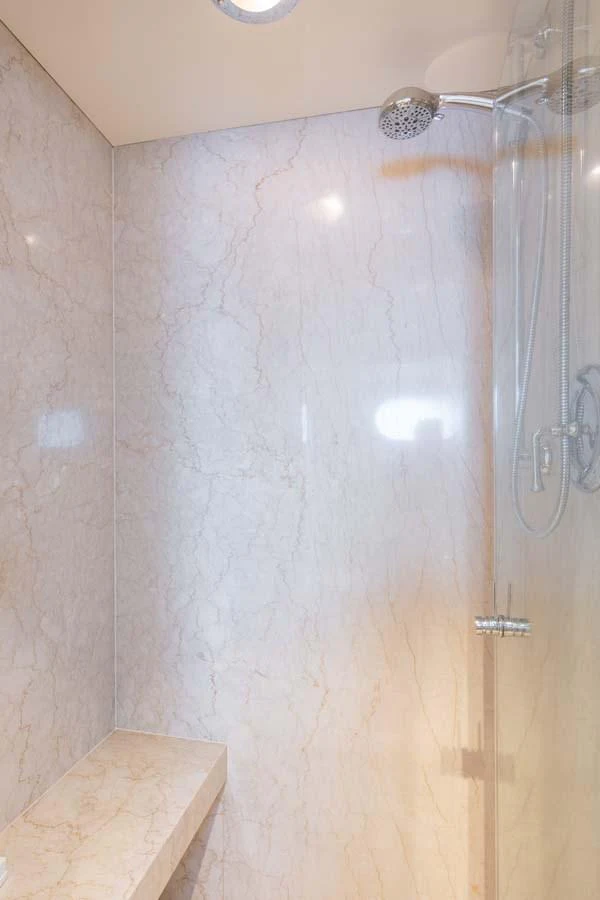 shower with a shower head aboard CHANSON Yacht for Sale