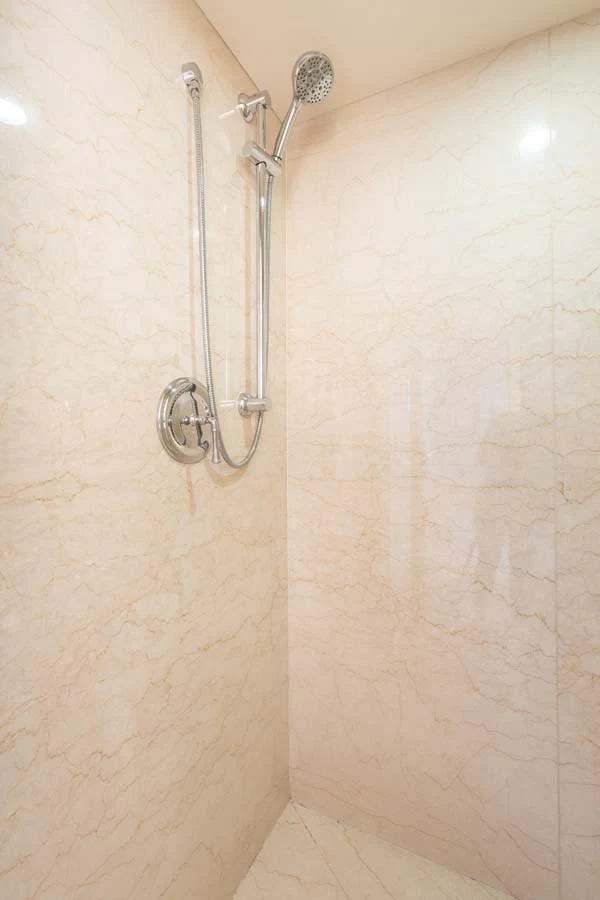 a shower with a shower head aboard CHANSON Yacht for Sale