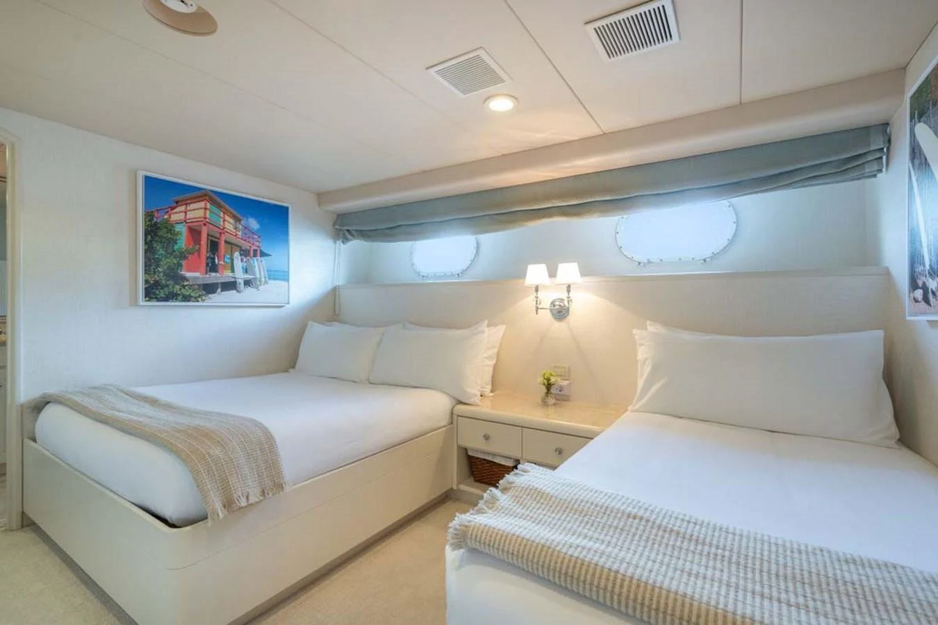 a room with two beds aboard CHANSON Yacht for Sale