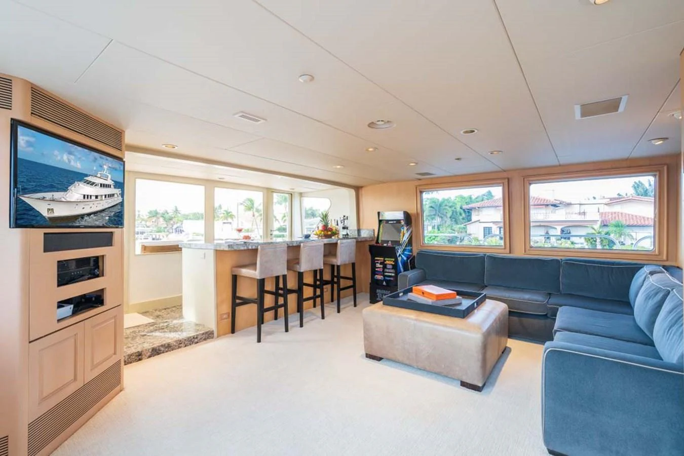 a living room with a couch and a tv aboard CHANSON Yacht for Sale