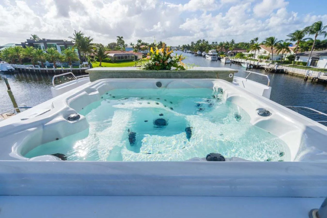 a swimming pool with a fountain aboard CHANSON Yacht for Sale