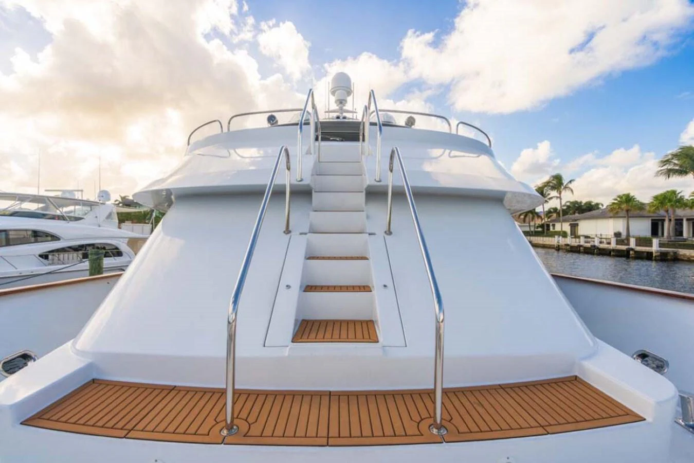 a boat with a staircase on the front aboard CHANSON Yacht for Sale