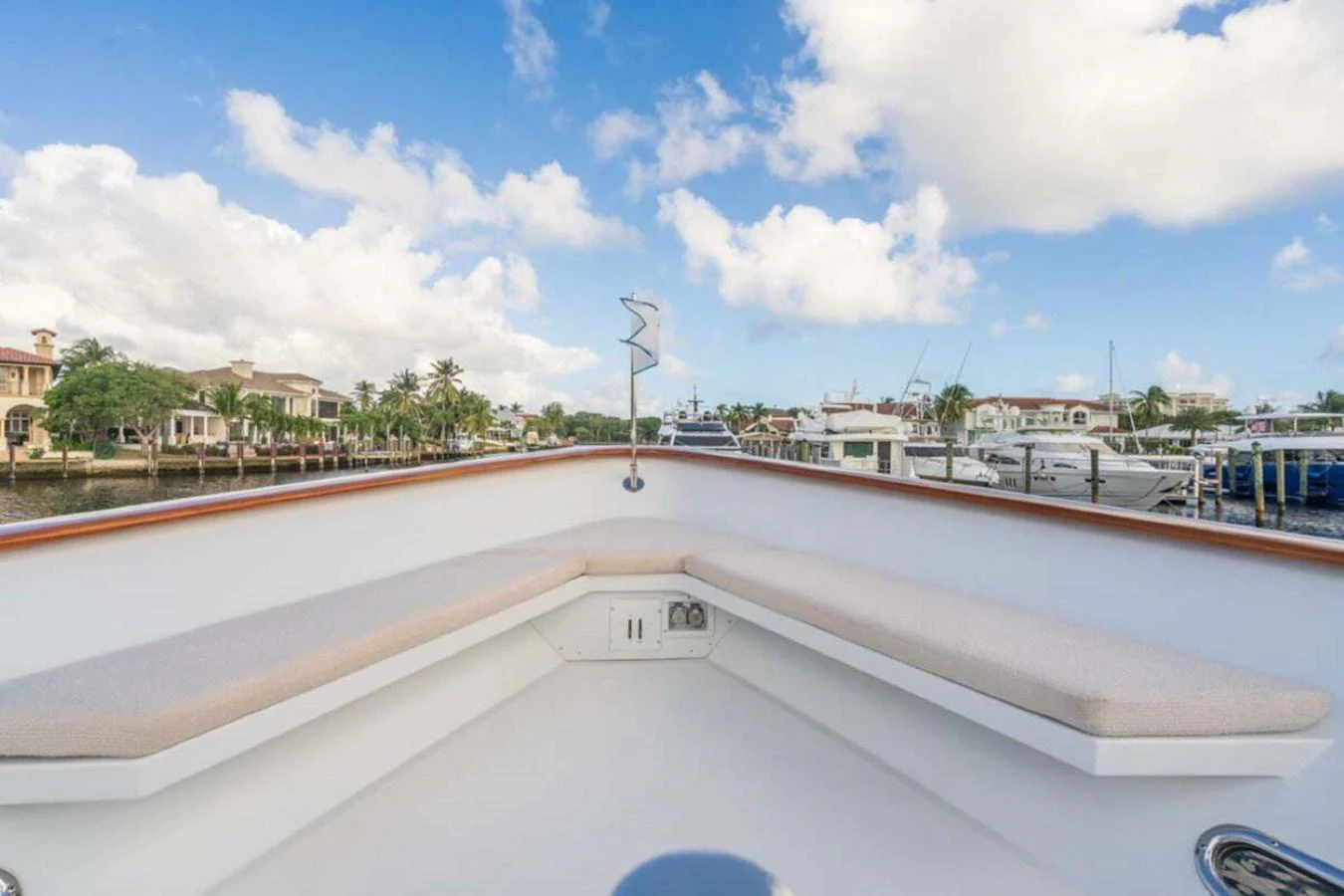 a white building with a crane on top aboard CHANSON Yacht for Sale