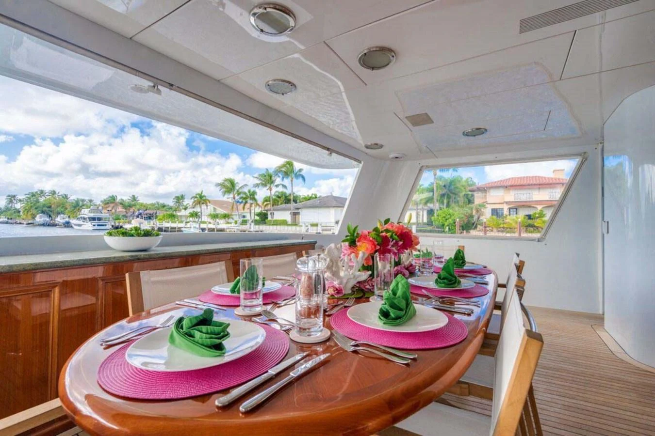 a table with plates and food on it aboard CHANSON Yacht for Sale