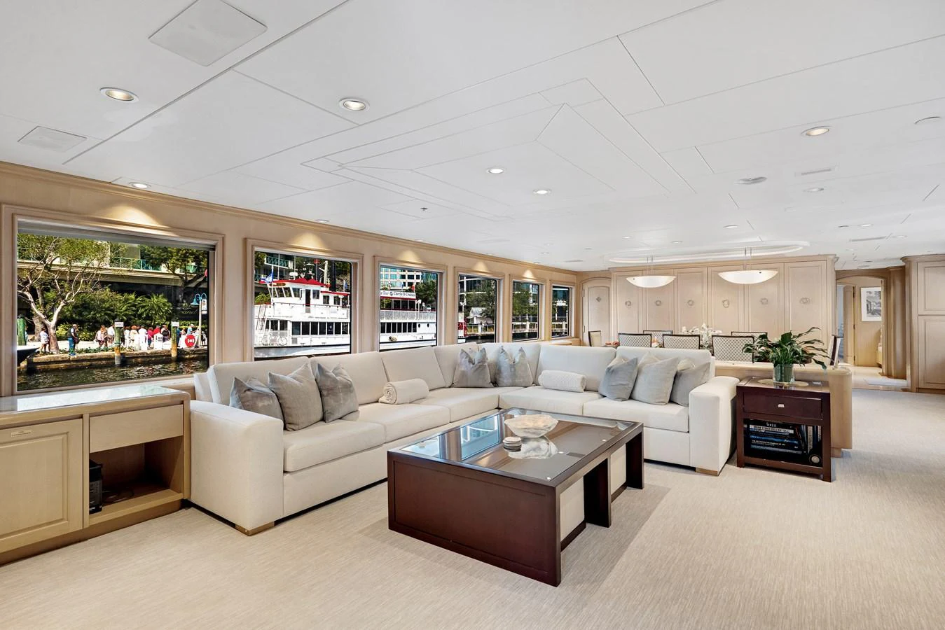 a living room with a couch and a coffee table aboard CHANSON Yacht for Sale