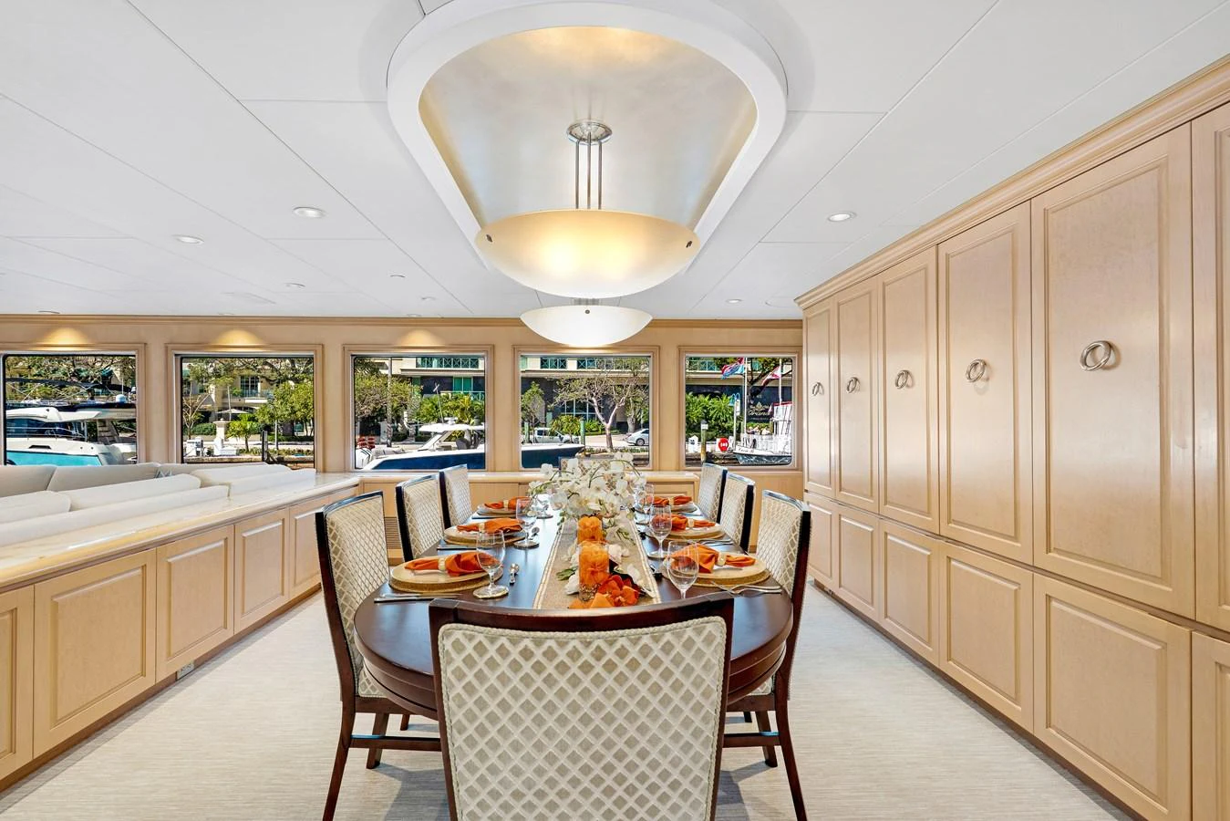 a kitchen with a dining table aboard CHANSON Yacht for Sale