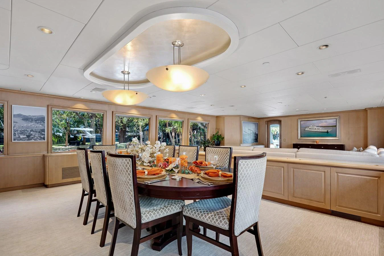 a large dining room with a table and chairs aboard CHANSON Yacht for Sale