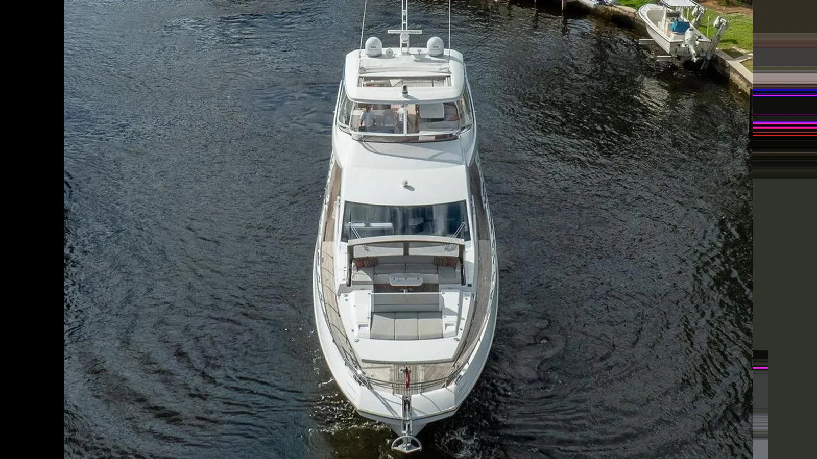 A luxurious yacht cruising through calm waters, showcasing its sleek design and spacious decks. aboard 2022 AZIMUT GRANDE 25 METRI Yacht for Sale
