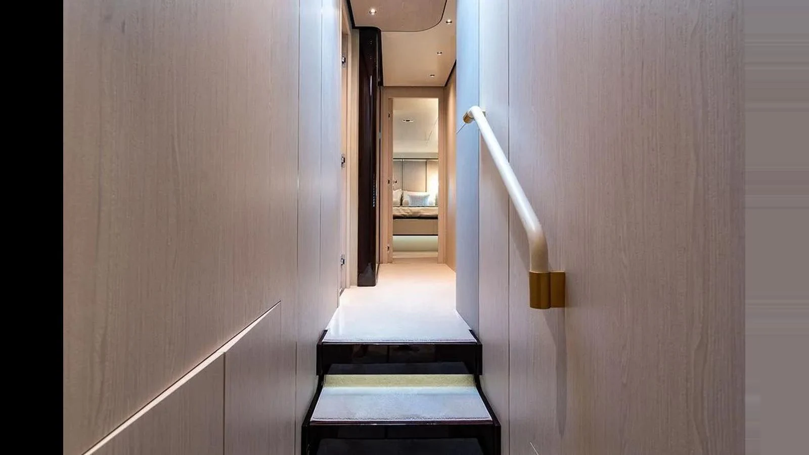 A sleek and modern hallway leads to a luxurious stateroom. aboard 2022 AZIMUT GRANDE 25 METRI Yacht for Sale
