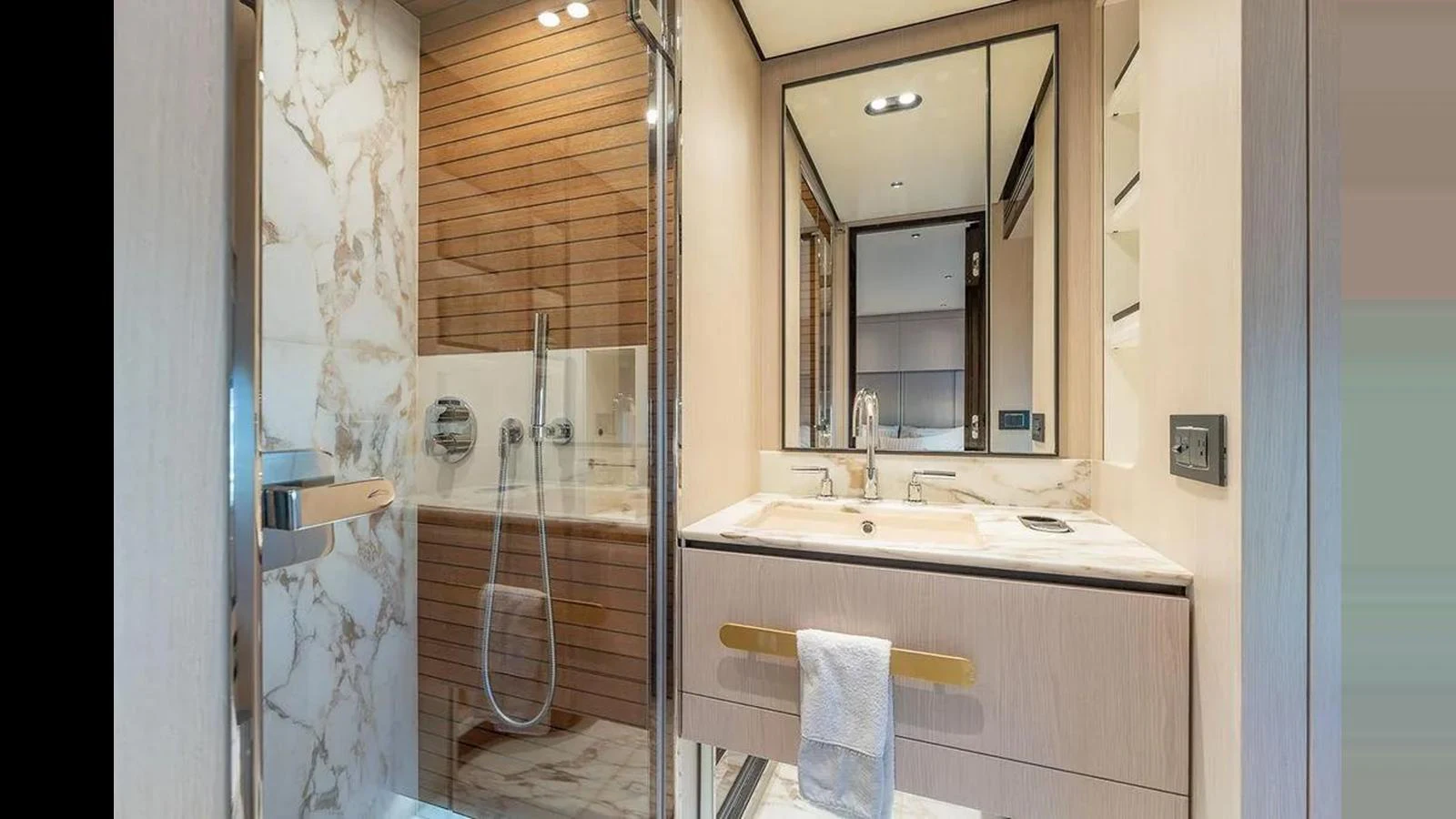 The yacht's bathroom features a luxurious design with marble accents and modern fixtures. aboard 2022 AZIMUT GRANDE 25 METRI Yacht for Sale