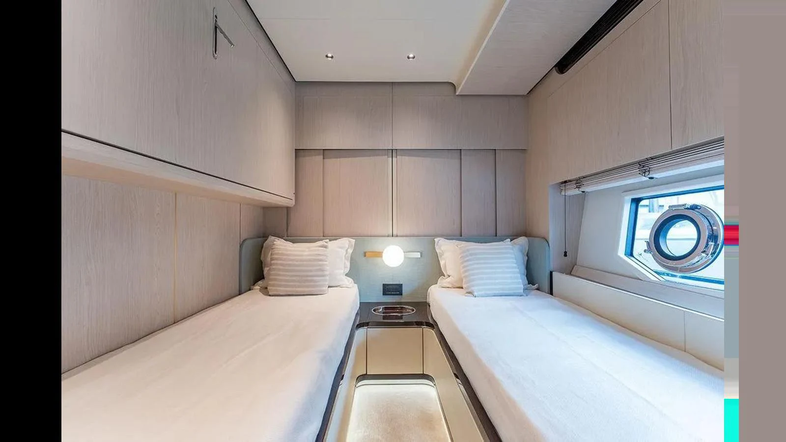 The twin stateroom offers a cozy and elegant space with two single beds and modern furnishings. aboard 2022 AZIMUT GRANDE 25 METRI Yacht for Sale