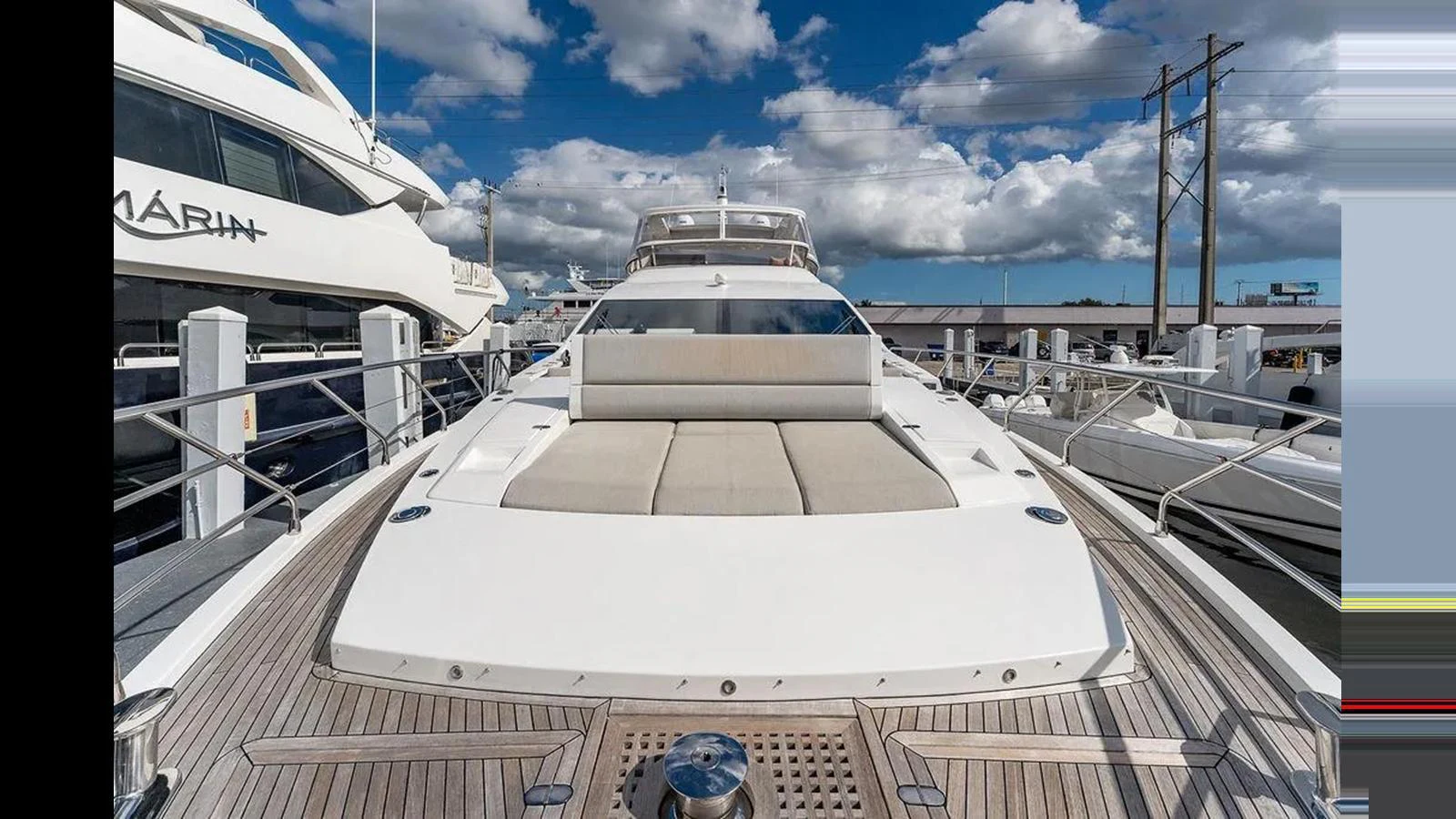 The yacht's foredeck features spacious sun pads for lounging under the open sky. aboard 2022 AZIMUT GRANDE 25 METRI Yacht for Sale