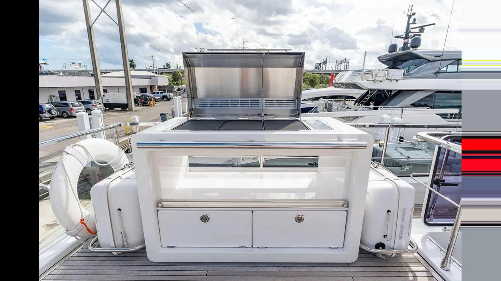 The yacht features a well-equipped grill station on the deck, perfect for outdoor dining. aboard 2022 AZIMUT GRANDE 25 METRI Yacht for Sale