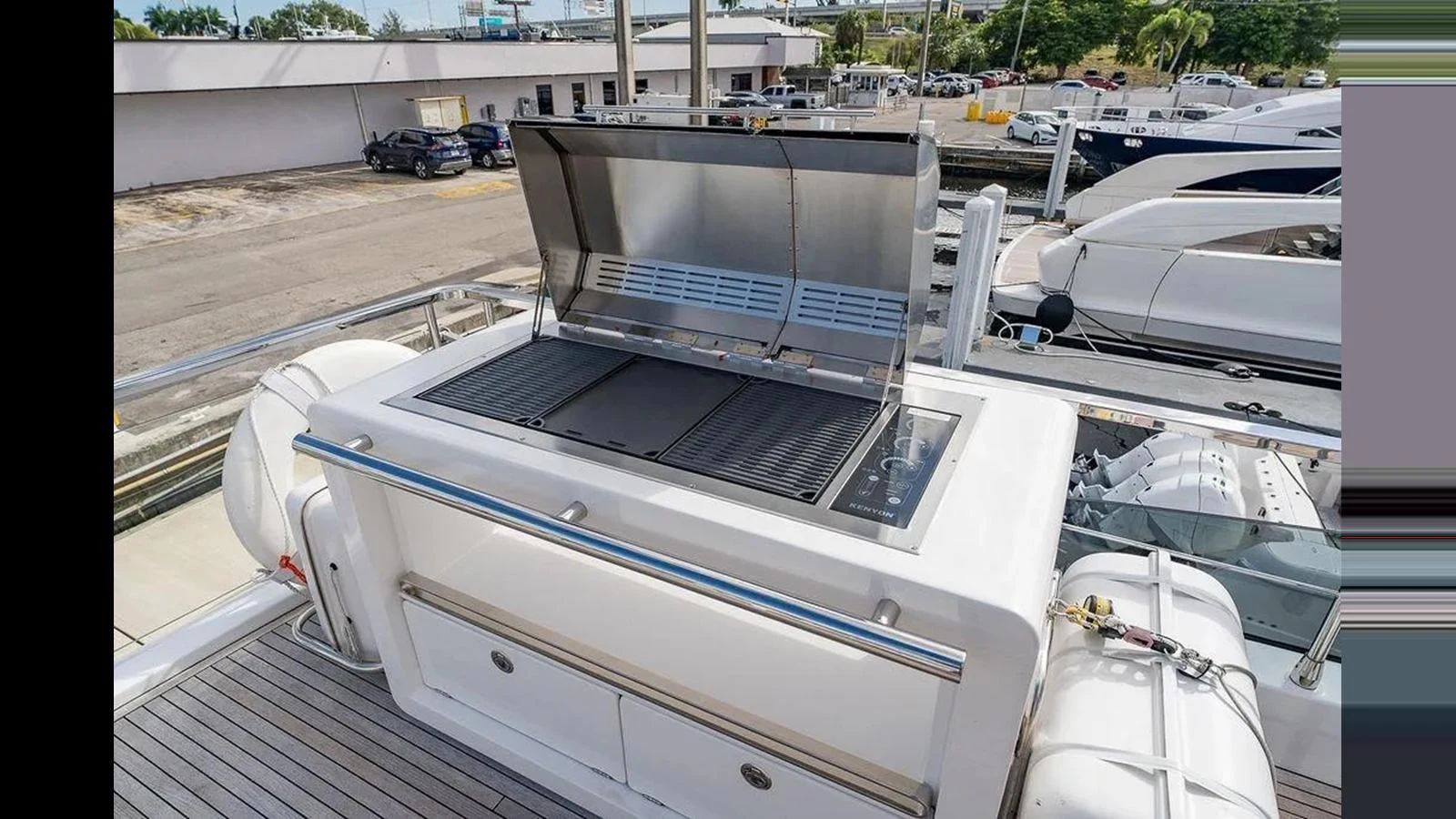 This image showcases a sleek outdoor grill on the yacht's deck, perfect for alfresco dining. aboard 2022 AZIMUT GRANDE 25 METRI Yacht for Sale