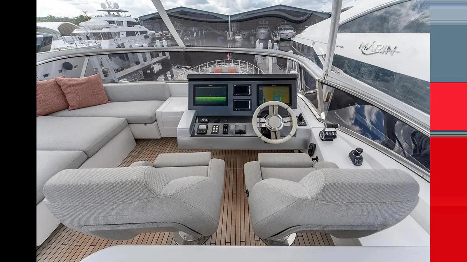 The helm area features modern navigation equipment and comfortable seating. aboard 2022 AZIMUT GRANDE 25 METRI Yacht for Sale