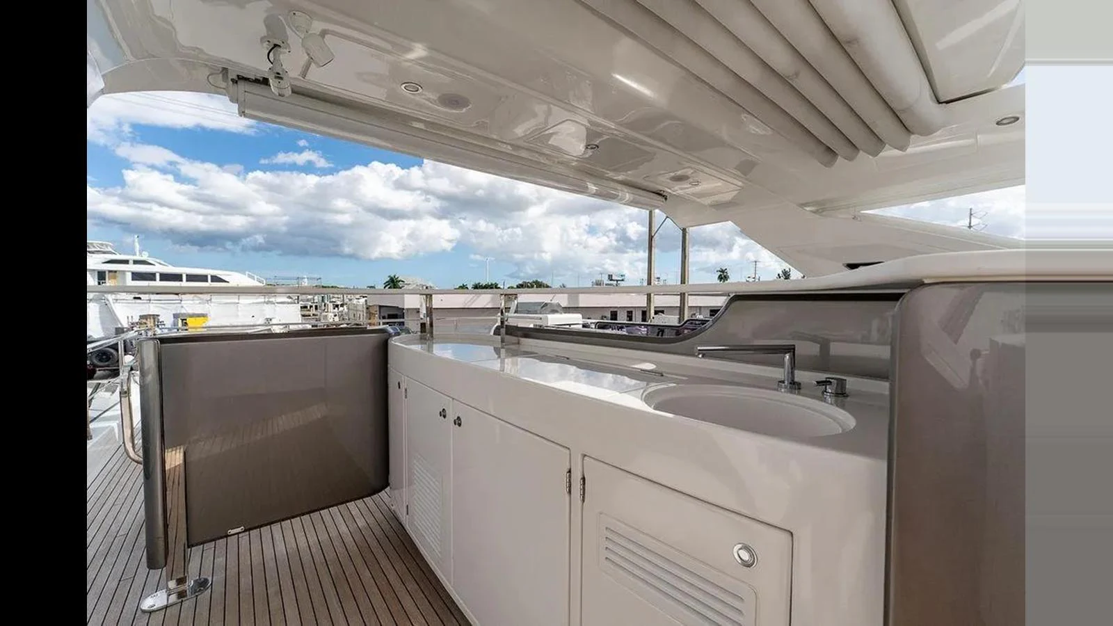 The flybridge offers a spacious and well-equipped area for outdoor enjoyment and relaxation. aboard 2022 AZIMUT GRANDE 25 METRI Yacht for Sale