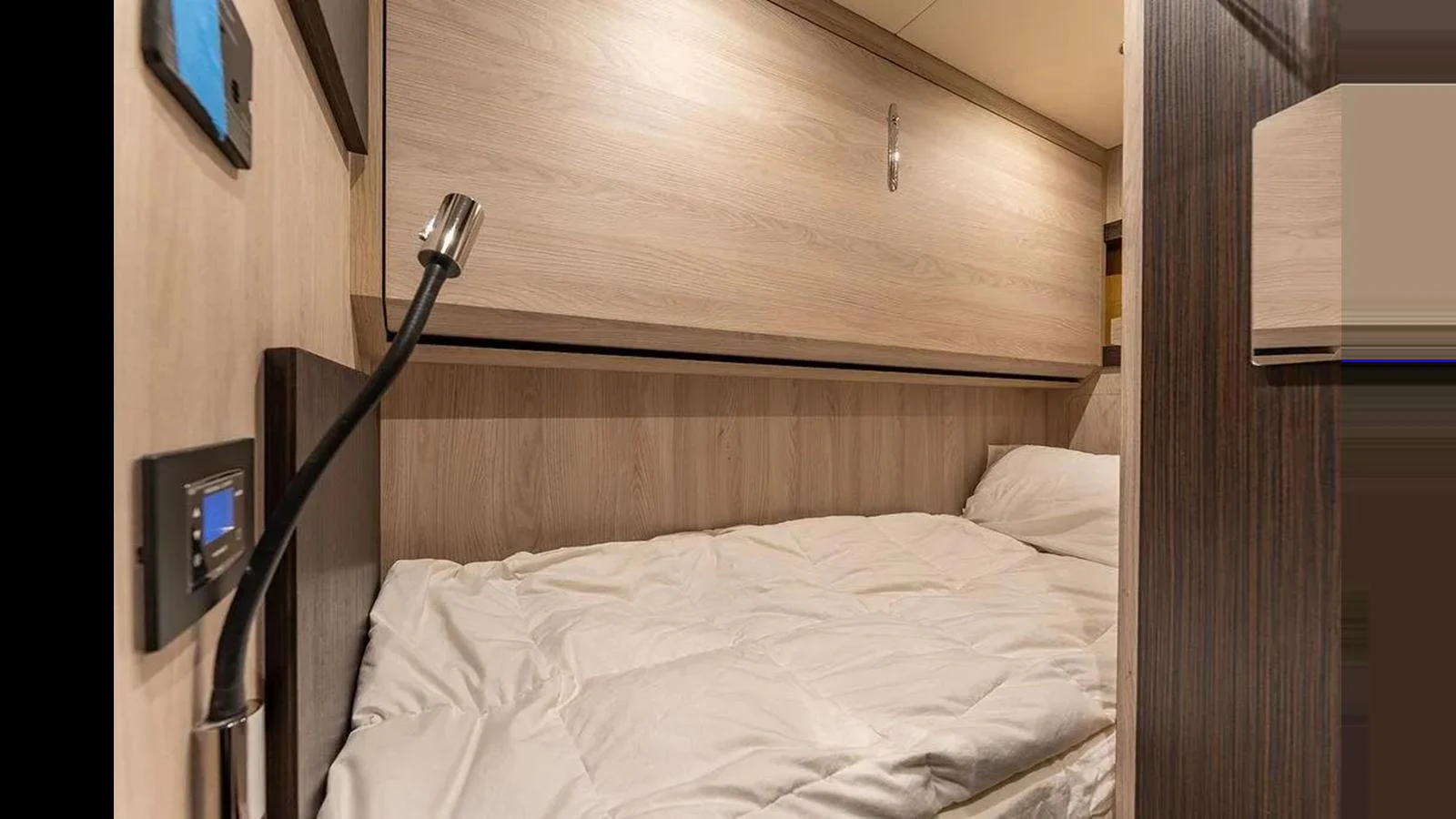 A cozy cabin with a single bed and modern lighting. aboard 2022 AZIMUT GRANDE 25 METRI Yacht for Sale