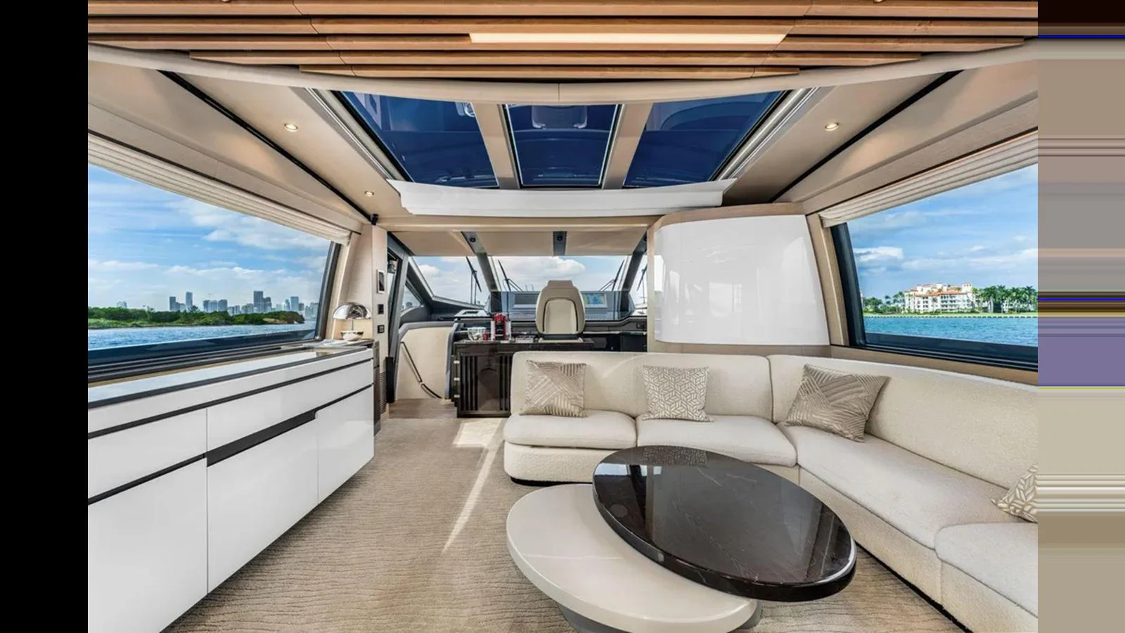 The yacht's salon features a spacious seating area with panoramic windows and a modern design. aboard 2022 AZIMUT S10 Yacht for Sale
