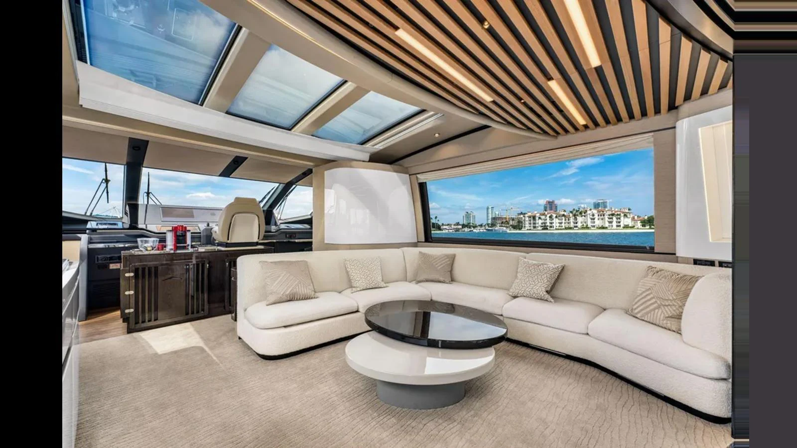 The salon offers a luxurious and spacious seating area with panoramic views. aboard 2022 AZIMUT S10 Yacht for Sale