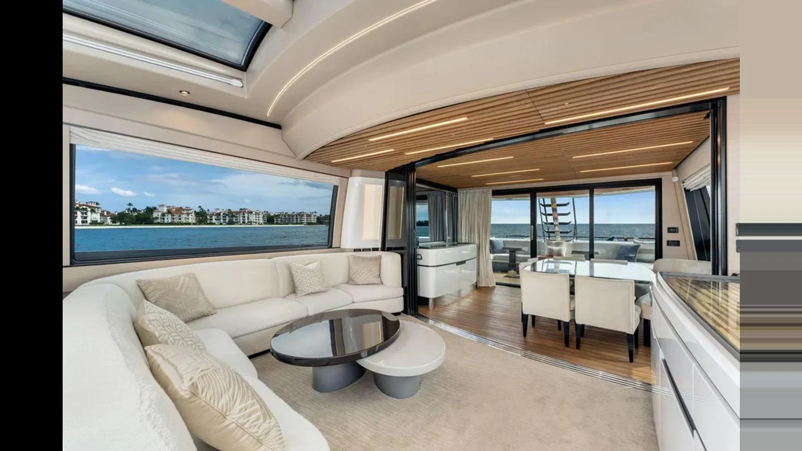 The salon offers a luxurious and spacious seating area with panoramic views. aboard 2022 AZIMUT S10 Yacht for Sale