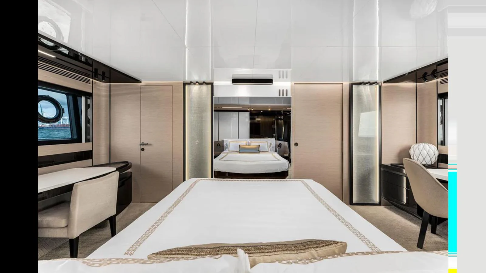 The master stateroom features a luxurious bed, elegant furnishings, and ample natural light. aboard 2022 AZIMUT S10 Yacht for Sale