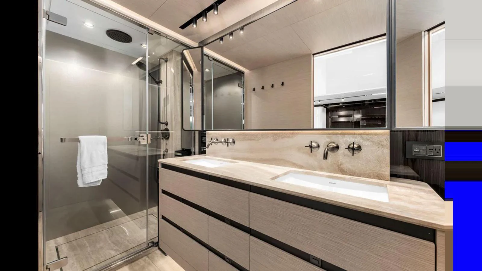 A luxurious yacht bathroom featuring a spacious shower and dual sinks with modern fixtures. aboard 2022 AZIMUT S10 Yacht for Sale