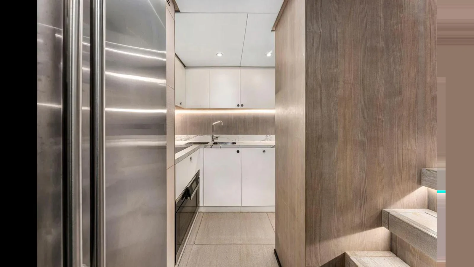 The yacht's galley features modern appliances and sleek cabinetry, creating a functional and stylish space. aboard 2022 AZIMUT S10 Yacht for Sale
