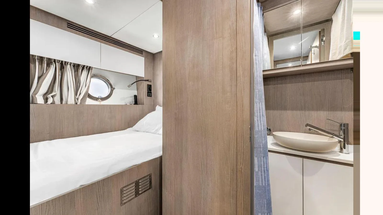 The guest cabin features a cozy bed and a compact en-suite bathroom with modern fixtures. aboard 2022 AZIMUT S10 Yacht for Sale
