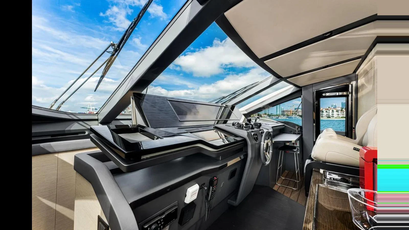 The helm station features modern controls and panoramic views. aboard 2022 AZIMUT S10 Yacht for Sale