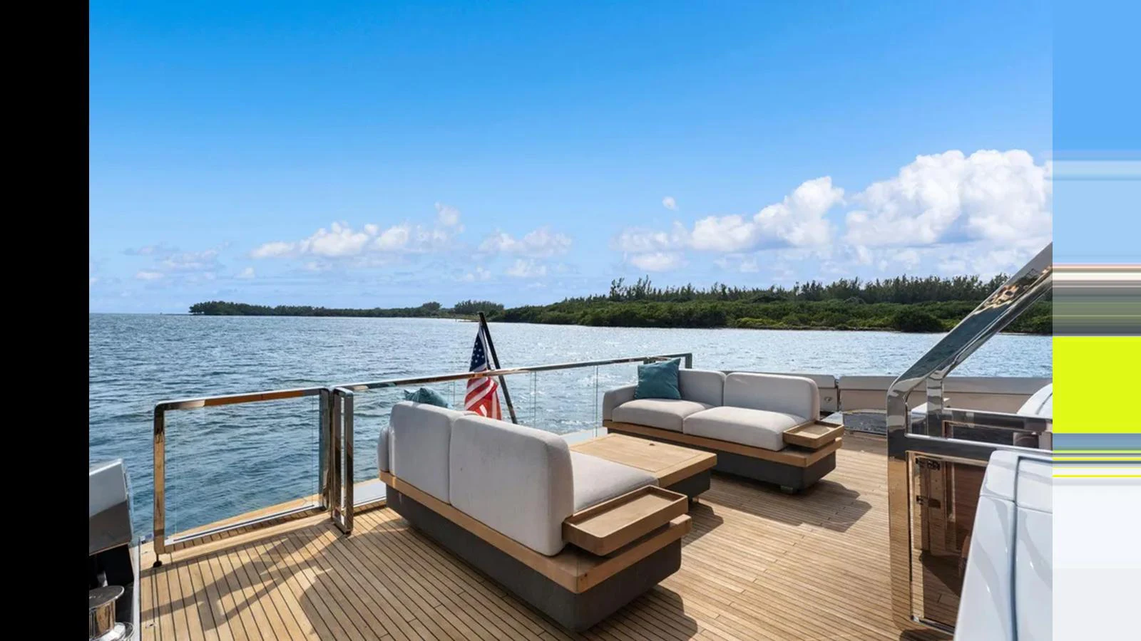 The aft deck offers a serene lounging area with comfortable seating and stunning views of the water. aboard 2022 AZIMUT S10 Yacht for Sale