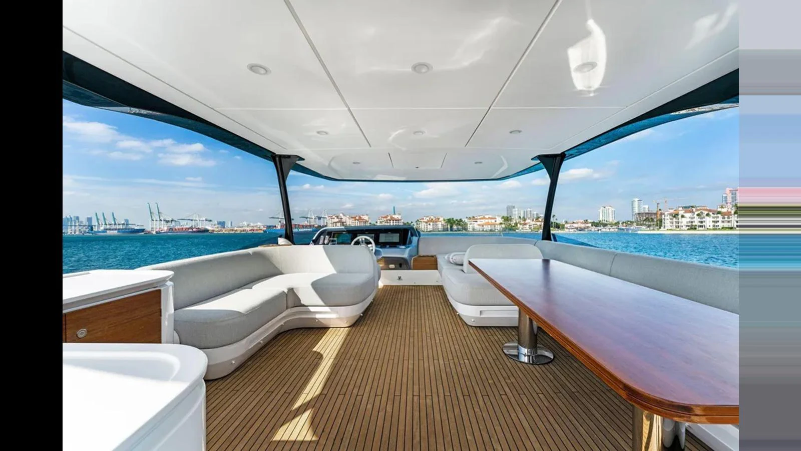 The flybridge offers a spacious and elegant area with ample seating and stunning views. aboard 2022 AZIMUT S10 Yacht for Sale