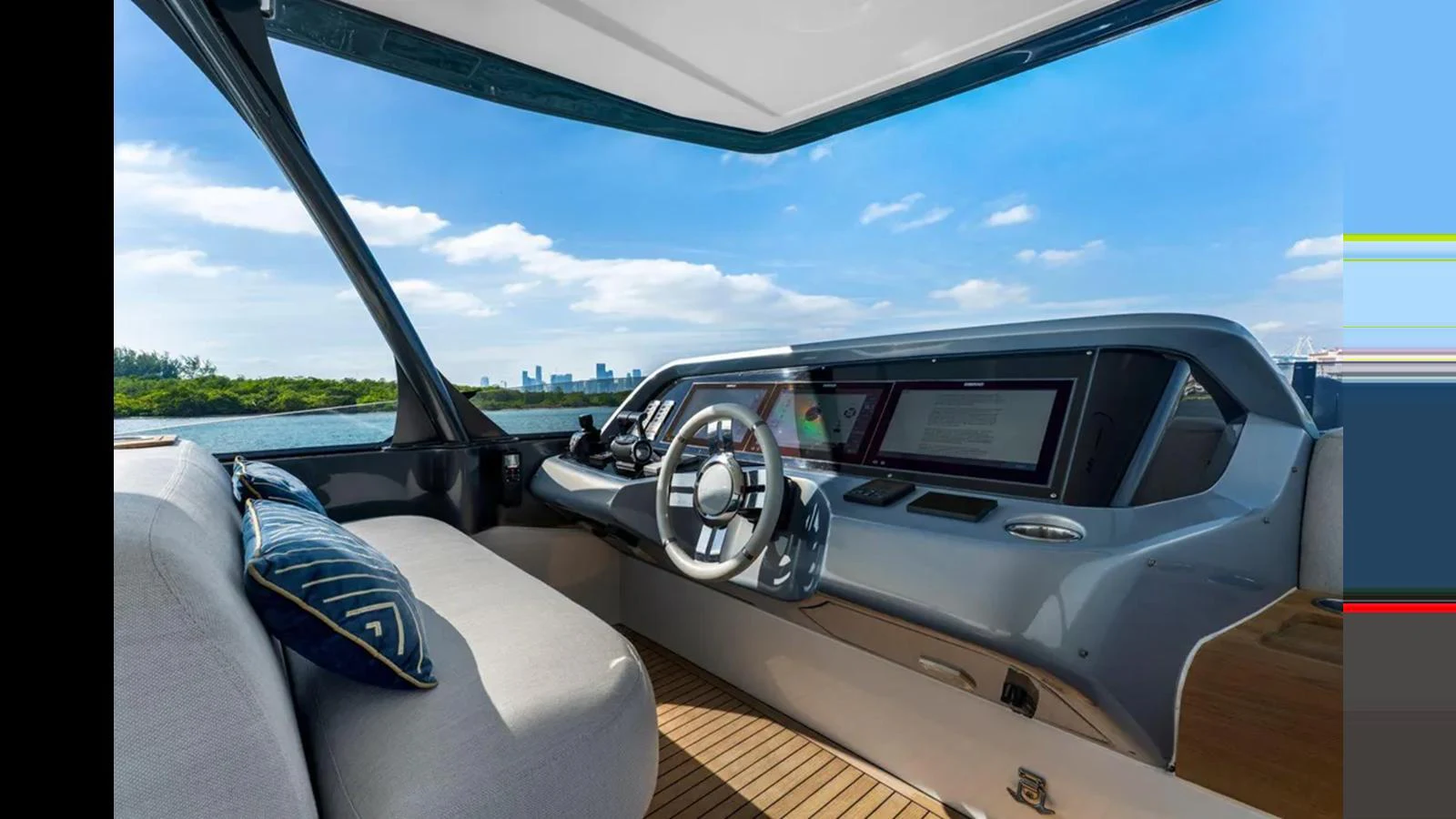 The helm station offers a sleek and modern design with a panoramic view of the water. aboard 2022 AZIMUT S10 Yacht for Sale