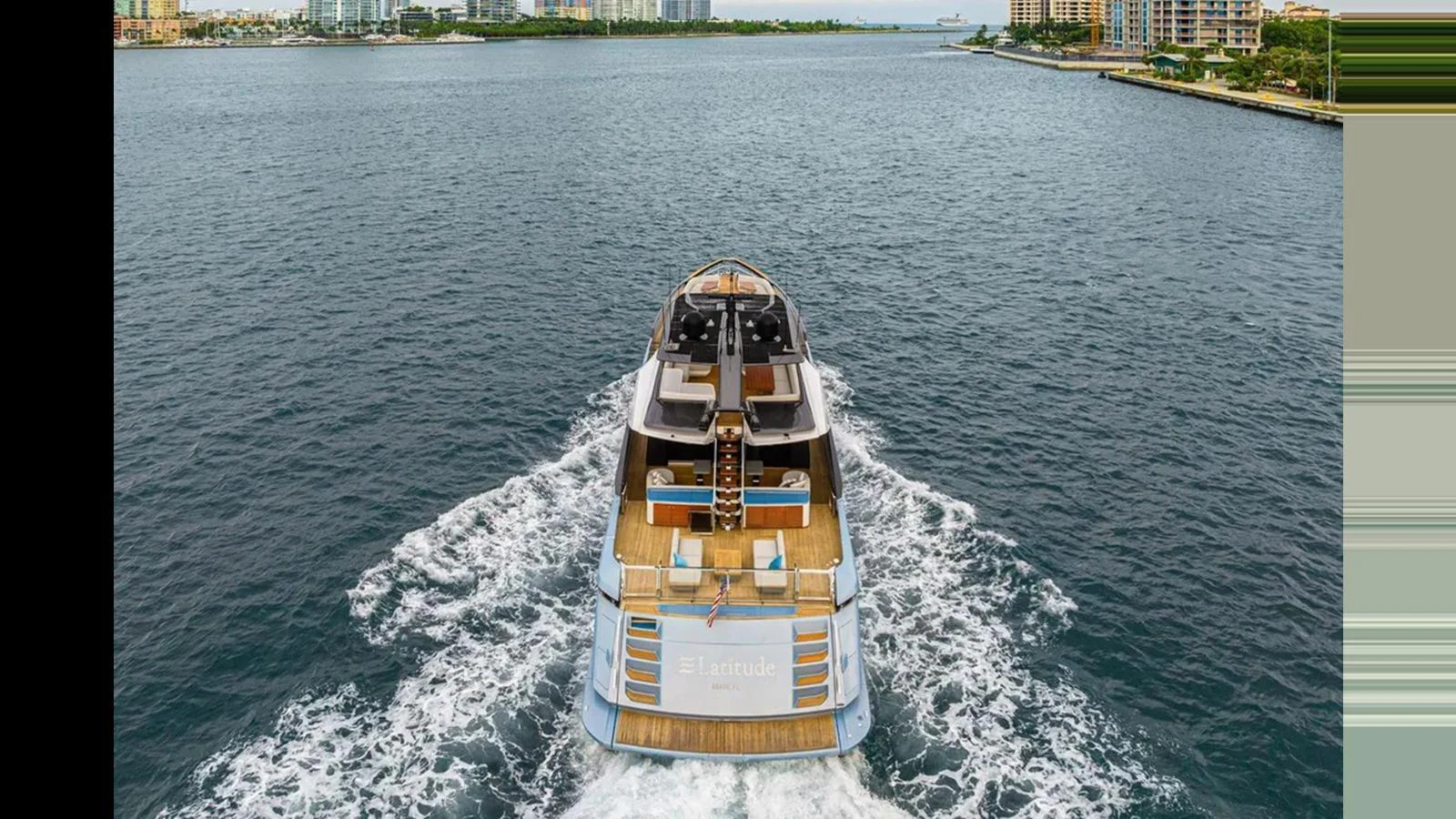 A luxurious yacht cruises through calm waters, showcasing its elegant design and spacious deck. aboard 2022 AZIMUT S10 Yacht for Sale