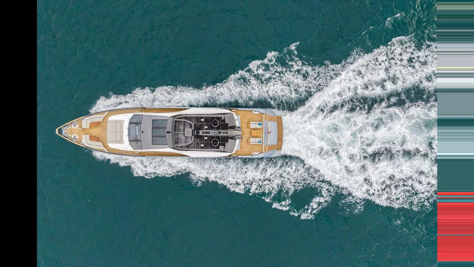 A sleek yacht cruises through the water, leaving a trail of white wake behind. aboard 2022 AZIMUT S10 Yacht for Sale