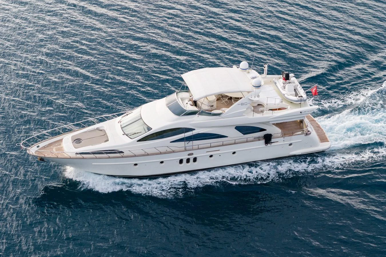 A sleek and modern yacht glides effortlessly across the water, showcasing its elegant design and luxurious amenities. aboard SENIOR S Yacht for Sale