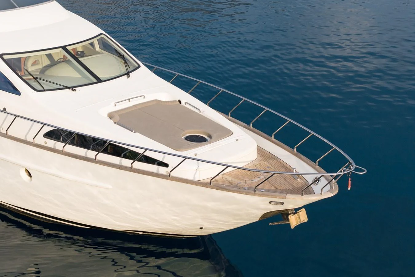 The sleek foredeck of the yacht features a spacious sunbathing area and modern design. aboard SENIOR S Yacht for Sale