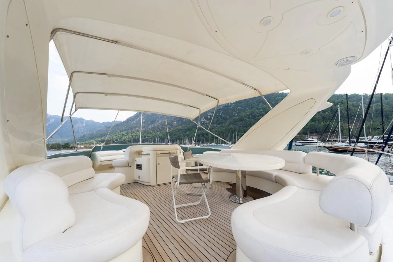 The flybridge offers a spacious and comfortable outdoor seating area with panoramic views. aboard SENIOR S Yacht for Sale