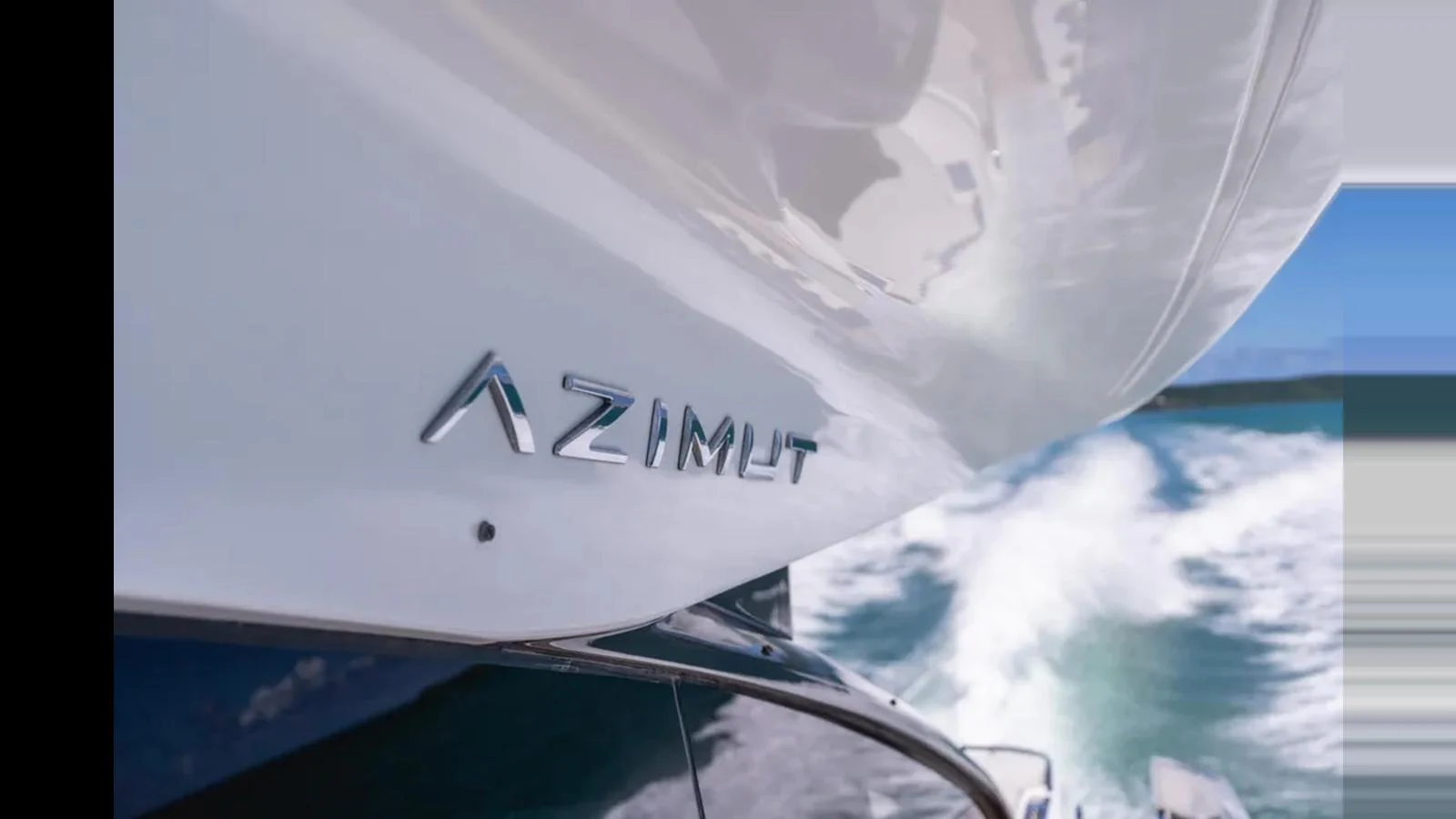 A close-up of the yacht's nameplate with the ocean in the background. aboard AZIMUT S7 Yacht for Sale