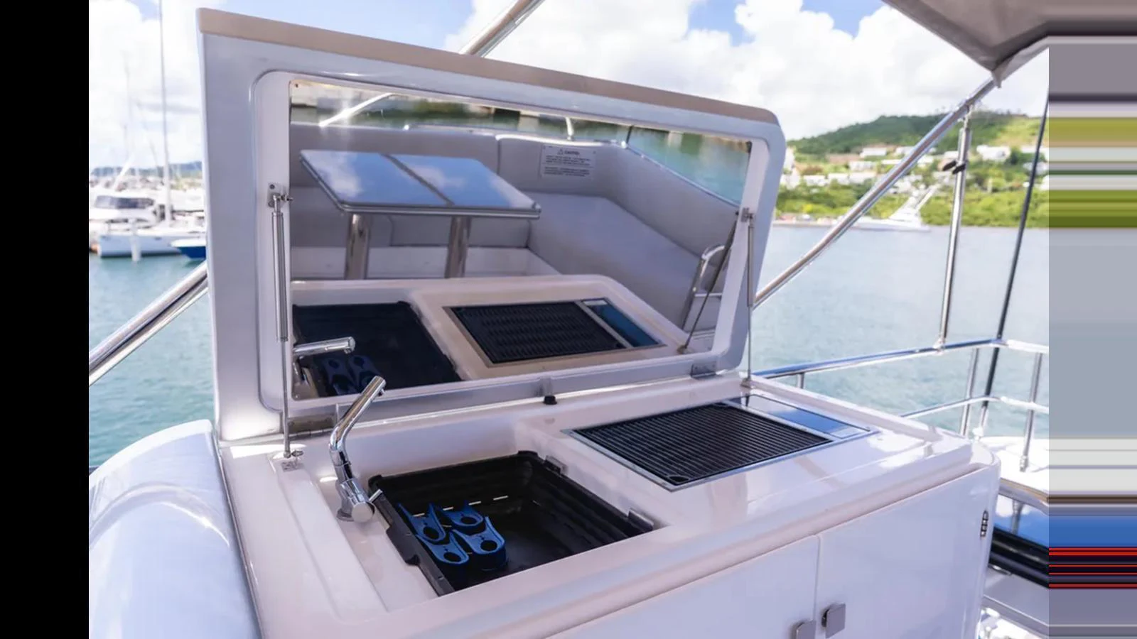 This image showcases a sleek outdoor grill station on the yacht, perfect for alfresco dining. aboard AZIMUT S7 Yacht for Sale