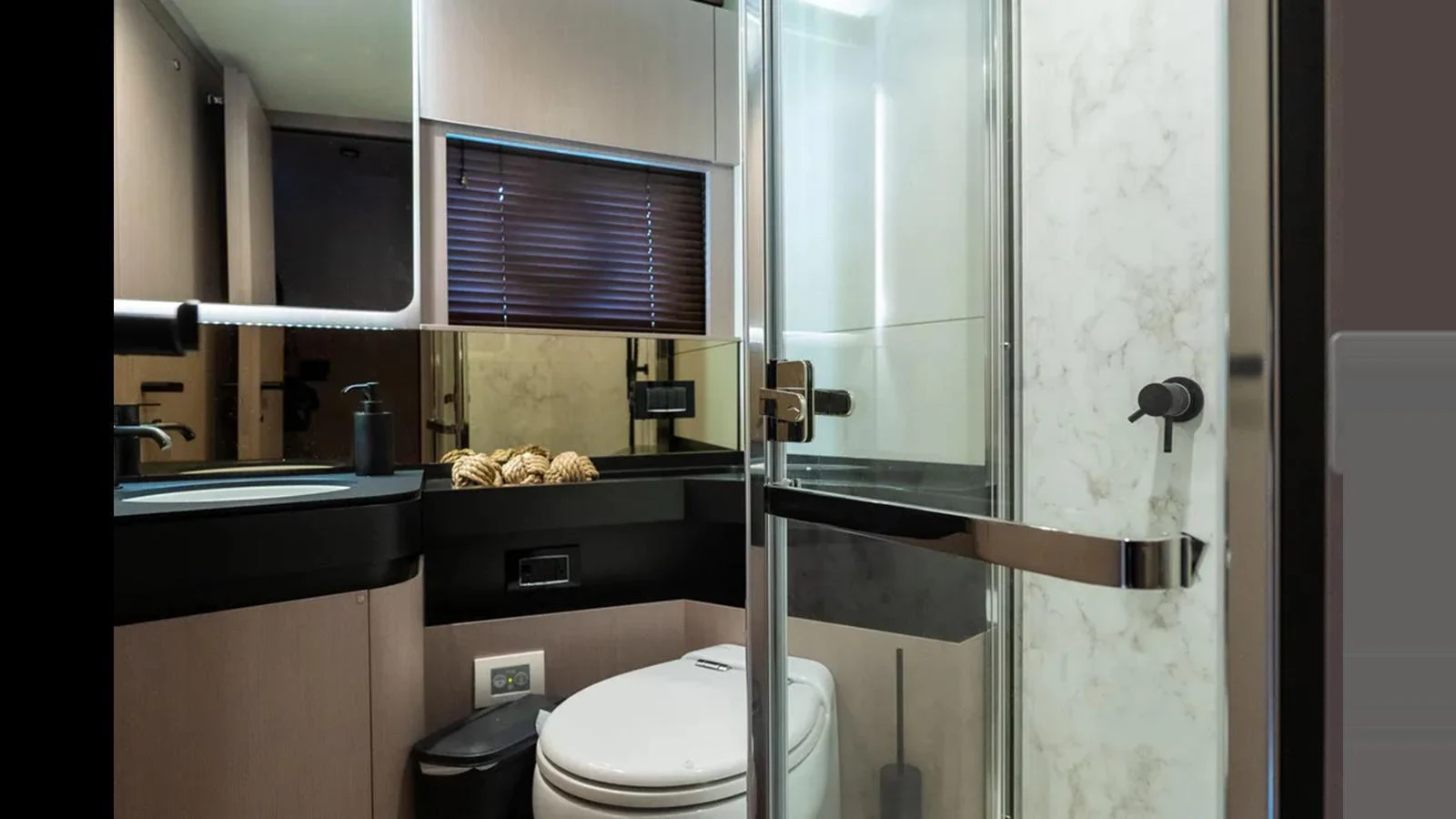 The yacht's bathroom features modern fixtures and a sleek design. aboard AZIMUT S7 Yacht for Sale