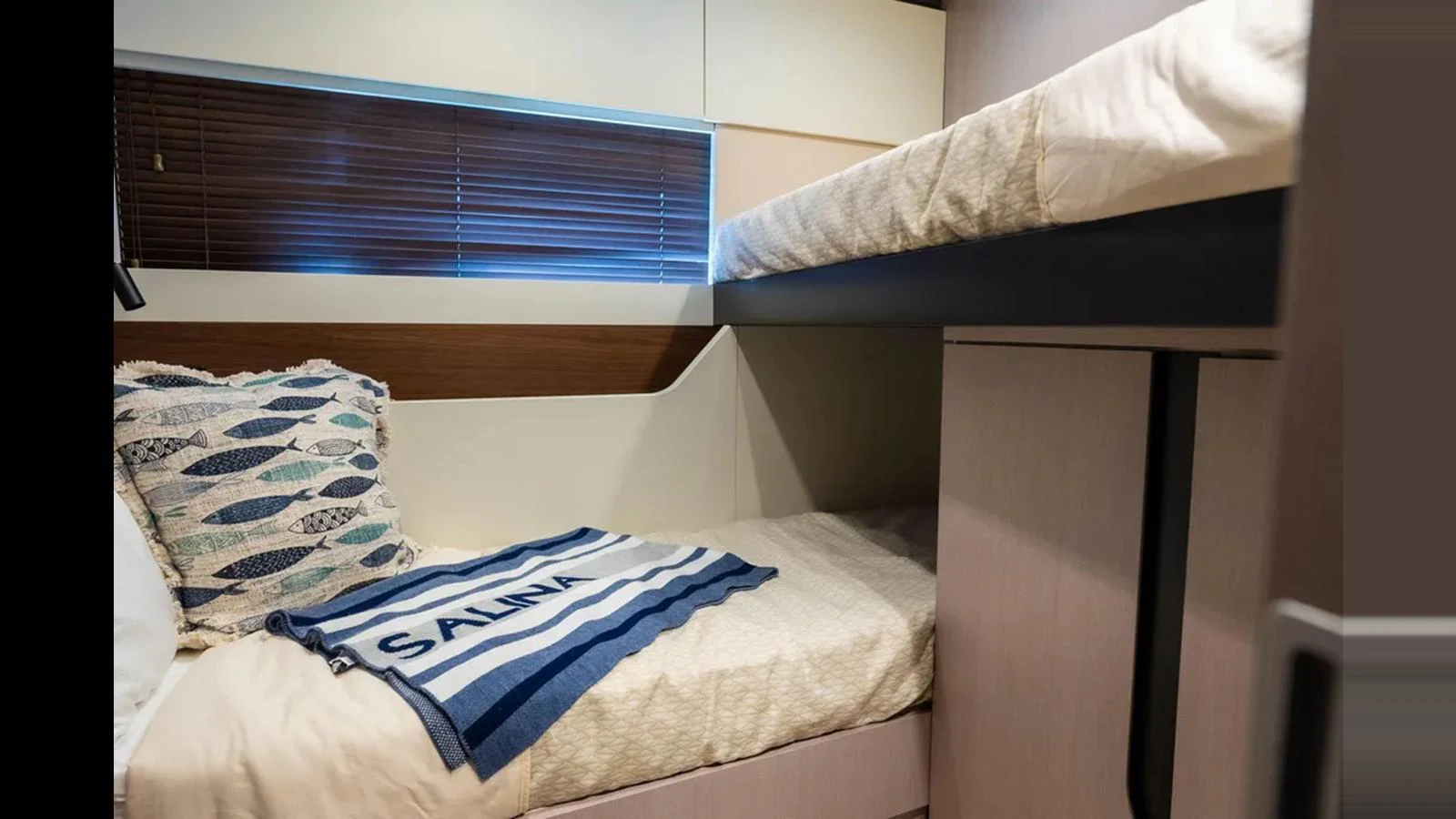 The guest cabin features cozy bunk beds with nautical-themed decor. aboard AZIMUT S7 Yacht for Sale