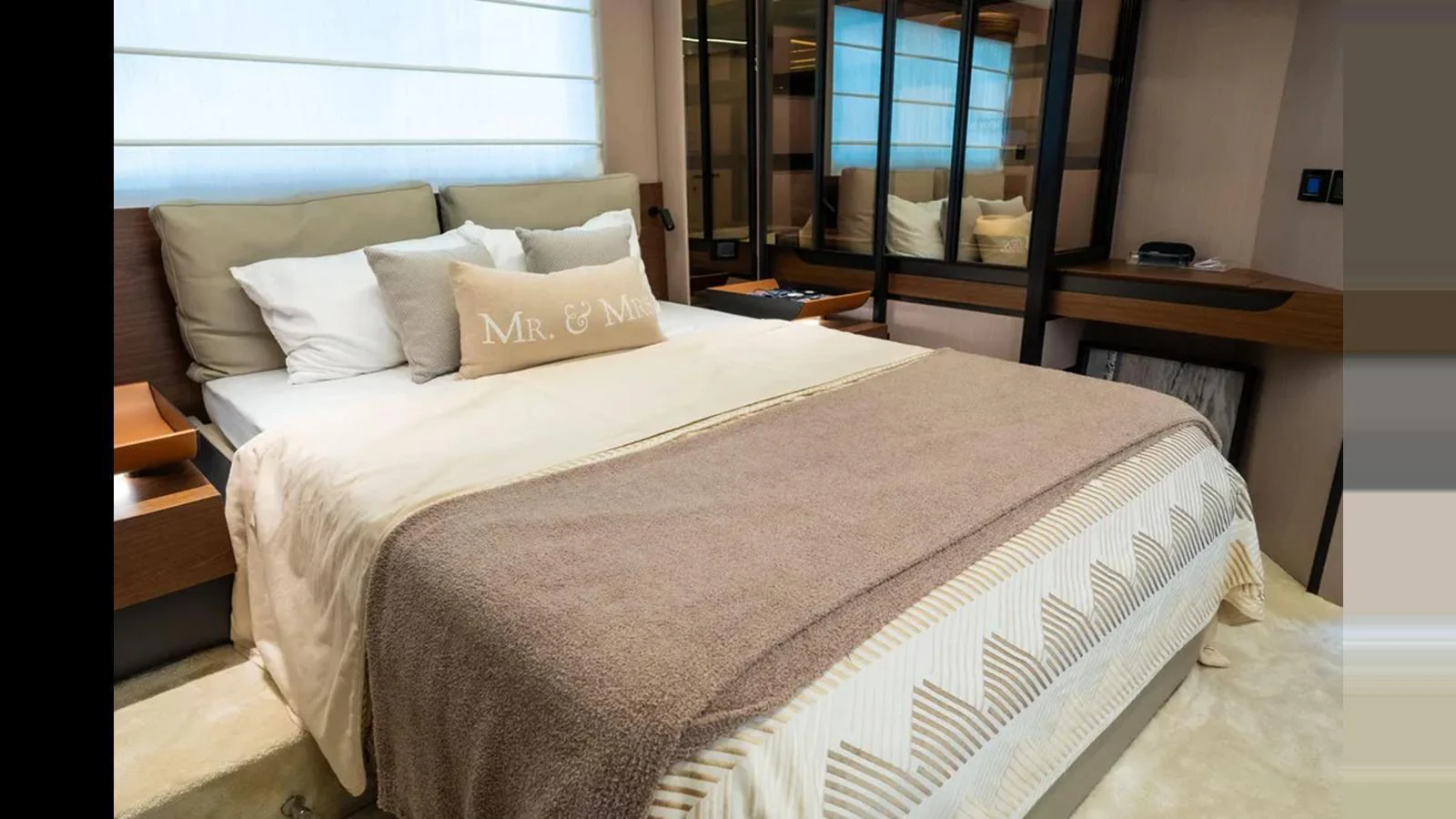 The stateroom features a comfortable bed with elegant bedding and ample storage space. aboard AZIMUT S7 Yacht for Sale